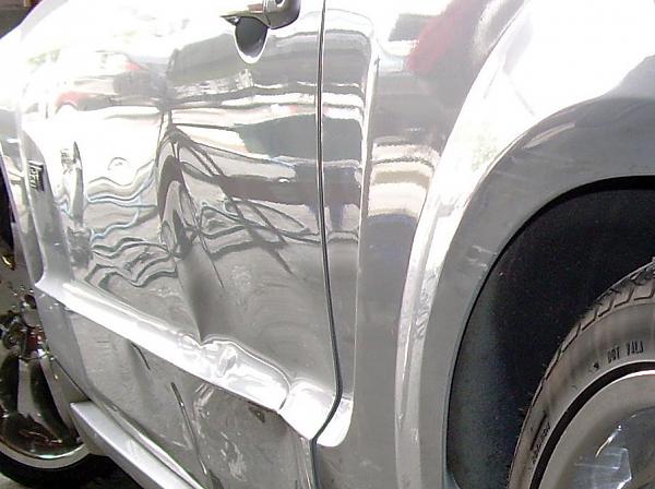Pics from the body shop (after the side swipe) and the culprits van-accident-pictures-002_edited.jpg