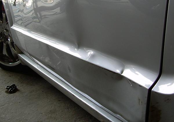 Pics from the body shop (after the side swipe) and the culprits van-accident-pictures-003_edited.jpg