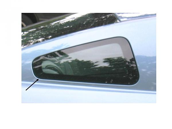 Factory Paint flaws?-06-stang-rear-quarter-window-arrow-.jpg
