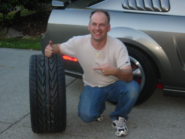 New wheels and tires now installed!-pointing-tire.jpg
