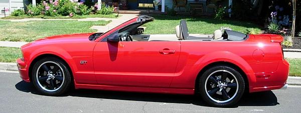 Anyone running a spinner kit on their Bullitts like this one?-2006-blackbullitts-14.jpg