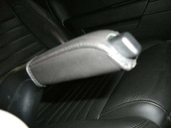 Pics of amustangrocks leather e-brake covers?-dscf1143.jpg