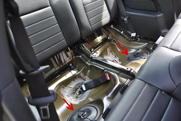 What are the plastic things under the rear seat?-underseat.jpg