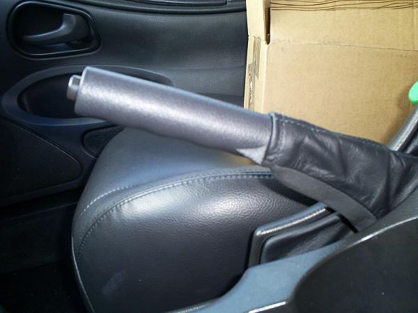 SN95 Padded Leather Console Armrest Covers by amustangrocksleather-edge-side-view-e-brake-installed-2.jpg