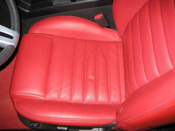 Red leather not holding up?-redscratch.jpg