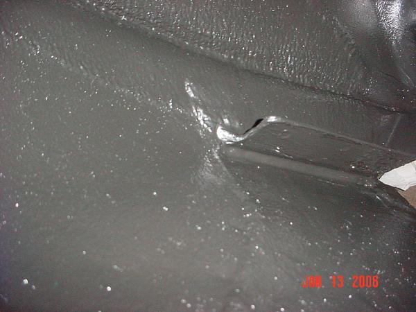 Spraying wheel wells to prevent that loud rock/dirt noise??-flap-after.jpg