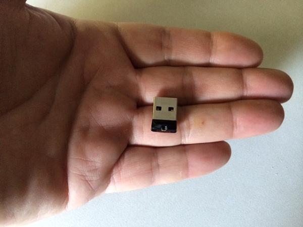 Can Itunes songs be put on a USB drive to keep in car?-tiny-usb.jpg