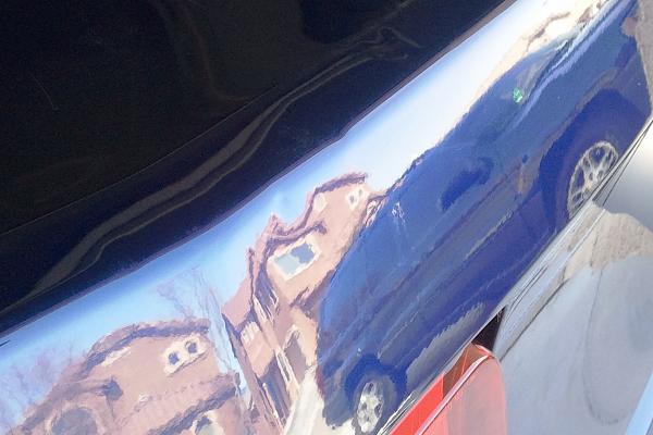 who do I call-mustang-dents-removing-original-spoiler-located-center-picture.jpg