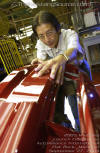 Francisco Liwag, a plastics paint inspector, ensures a perfect finish on bumpers.