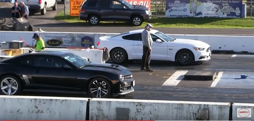 A Supercharged Mustang Duels With a Camaro ZL1 on the Strip