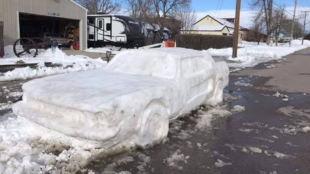 themustangsource.com Nebraska Family Sculpts Snow into a Vintage Ford Mustang