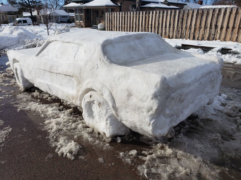 themustangsource.com Nebraska Family Sculpts Snow into a Vintage Ford Mustang