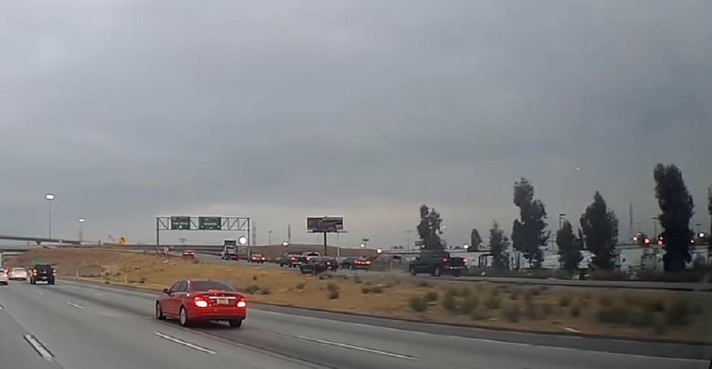 Caught on Dash Cam: Wild Mustang Carves Out its Own Lane
