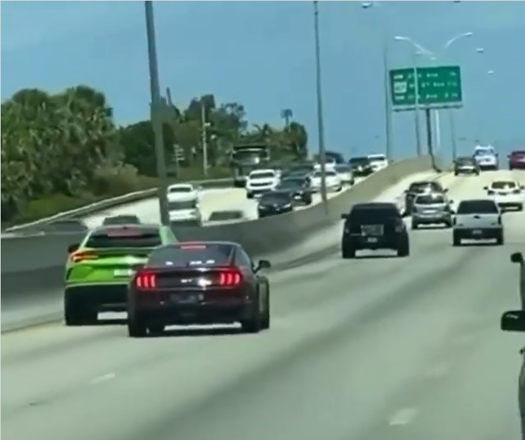 Unmarked Ford Mustang GT Takes Down a Lamborghini Urus