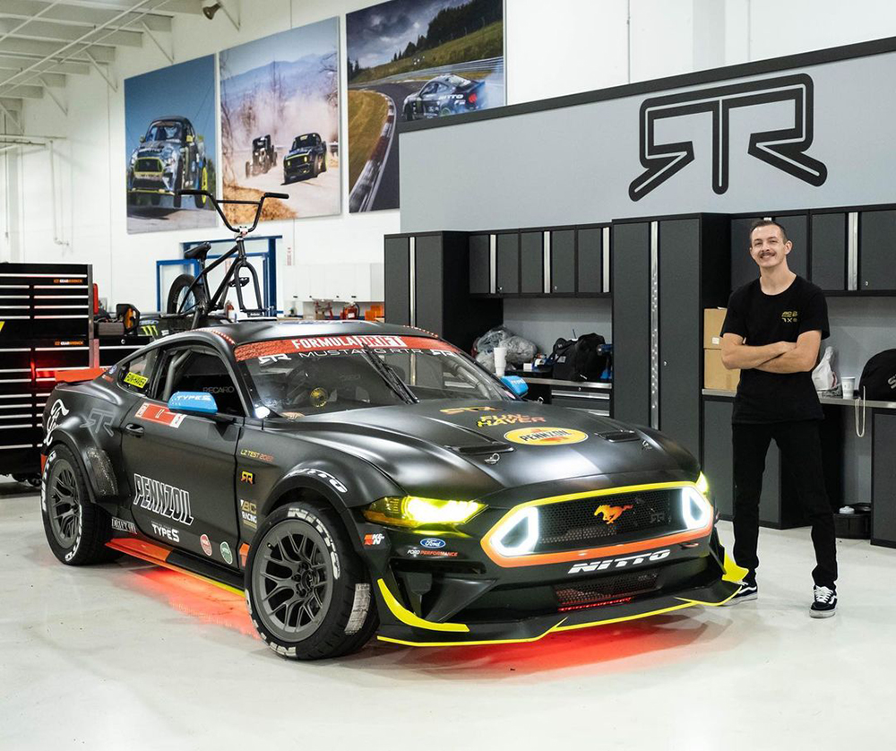 Adam LZ Posing With Ford mustang RTTR Spec 5D