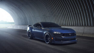 2024 Ford Mustang Dark Horse front 3/4 driving in a tunnel